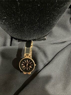 Anne Klein Gold Tone Watch with Black Dial and Enamel Bracelet